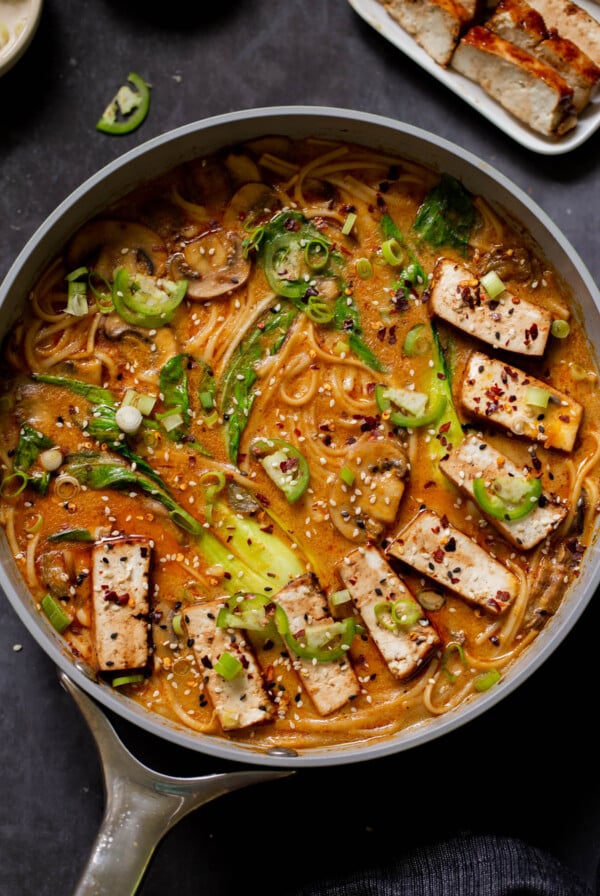 vegan tonkotsu in the pan after adding tofu and toppings