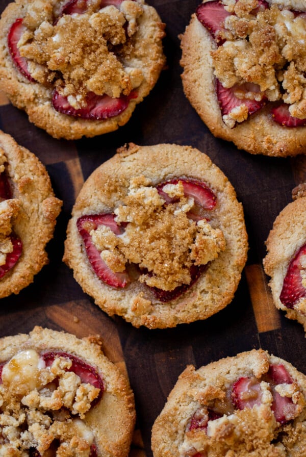 strawberry cheesecake cookies on a wooden serving tray