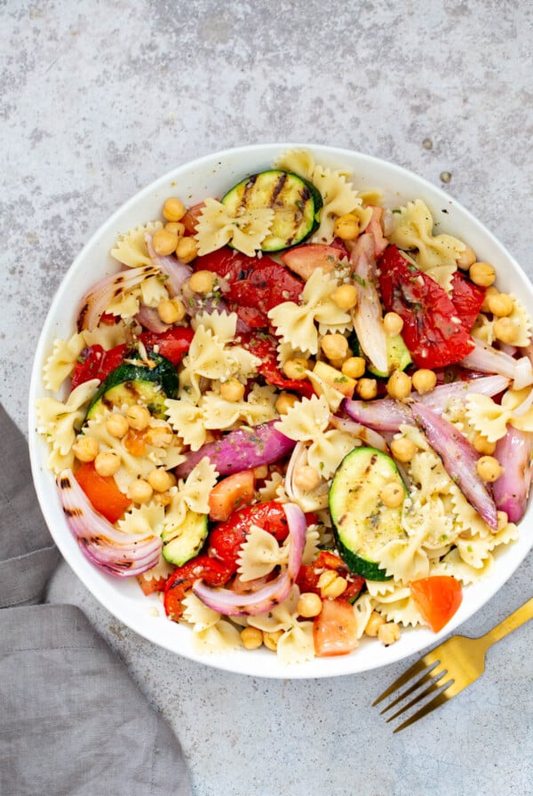 vegan summer pasta salad with grilled vegetables in a bowl