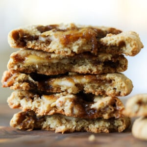 stack of halved tiramisu cookies, so you can see inside them