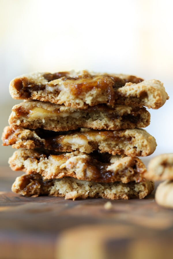 stack of halved tiramisu cookies, so you can see inside them