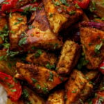 close-up of tofu tray bake with vegetables