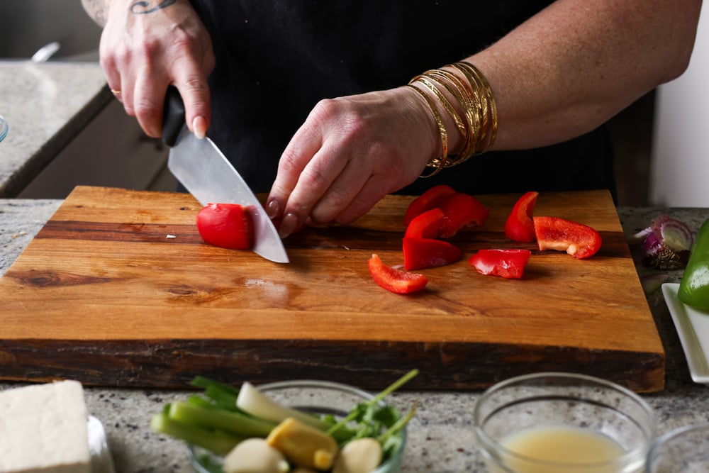 chopping red bell pepper