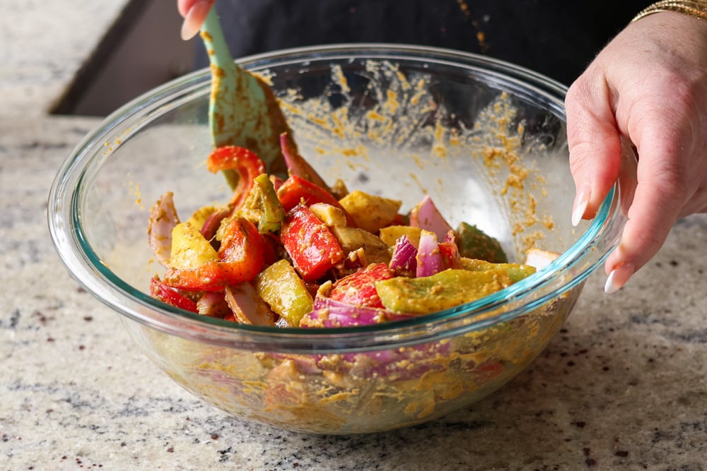 mixing the veggies and marinade together