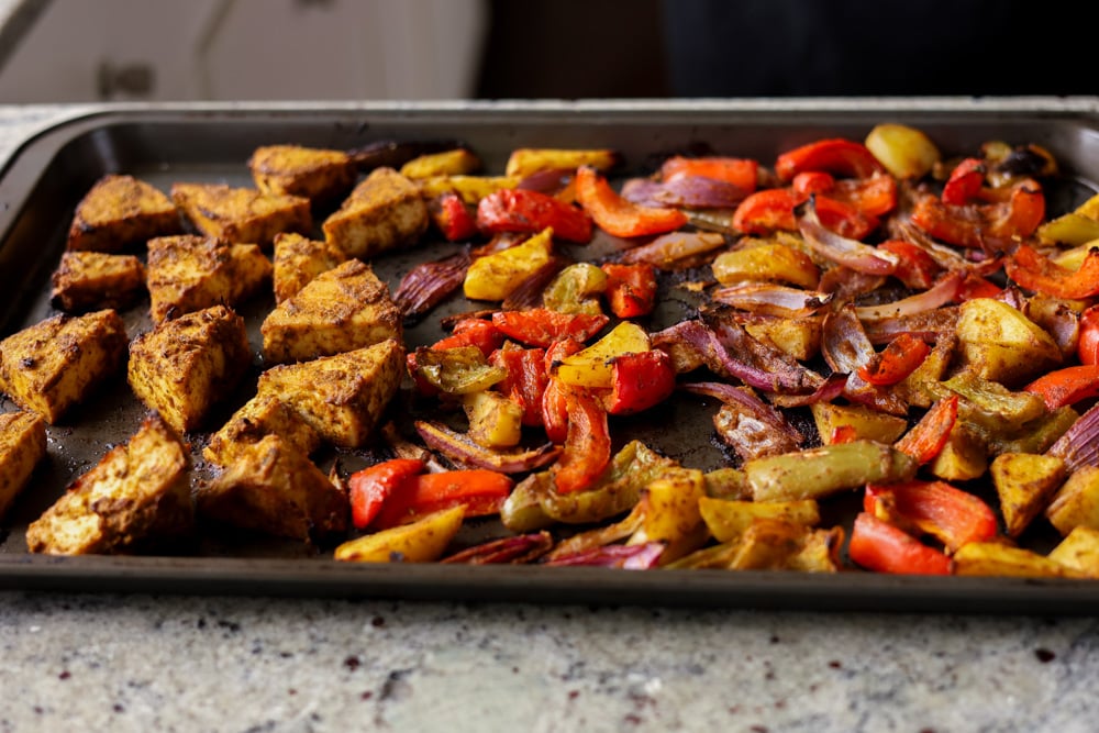 tofu and vegetables on the tray after baking