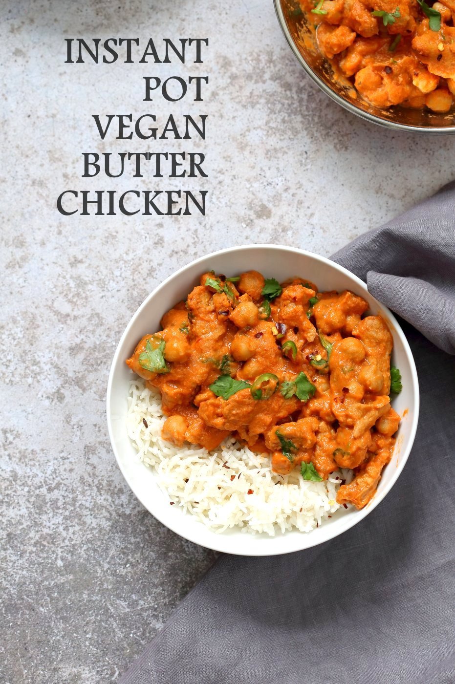 Vegan Butter Chicken in a Bowl with Rice, kept on concrete. Instant Pot Vegan Butter Soycurls and Chickpeas