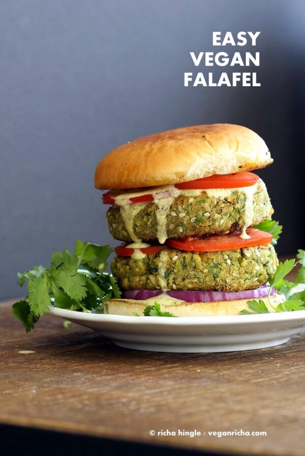 Easy Vegan Falafel Burger. Chickpea patties with tahini dressing and hummus make for a filling and flavorful burger. Vegan Soy-free Recipe. Can be made gluten-free | VeganRicha.com