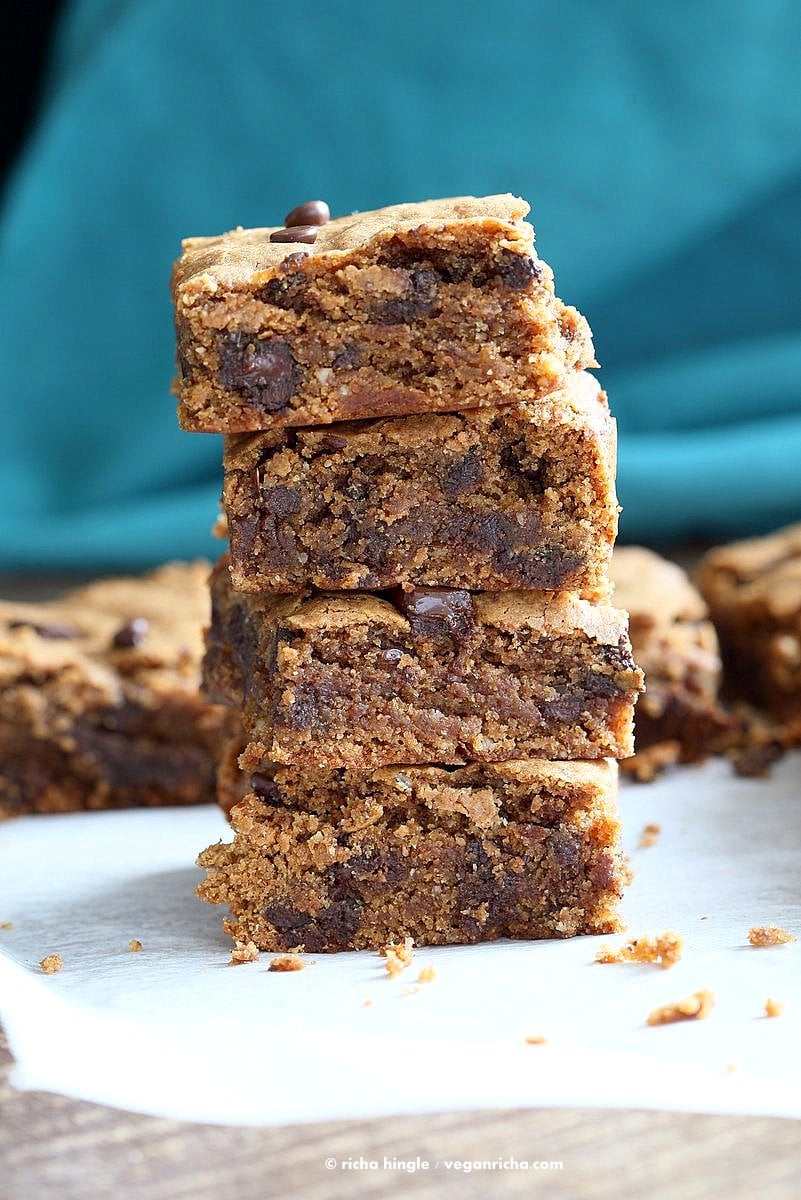 stack of gluten-free almond butter blondies on a paper towel