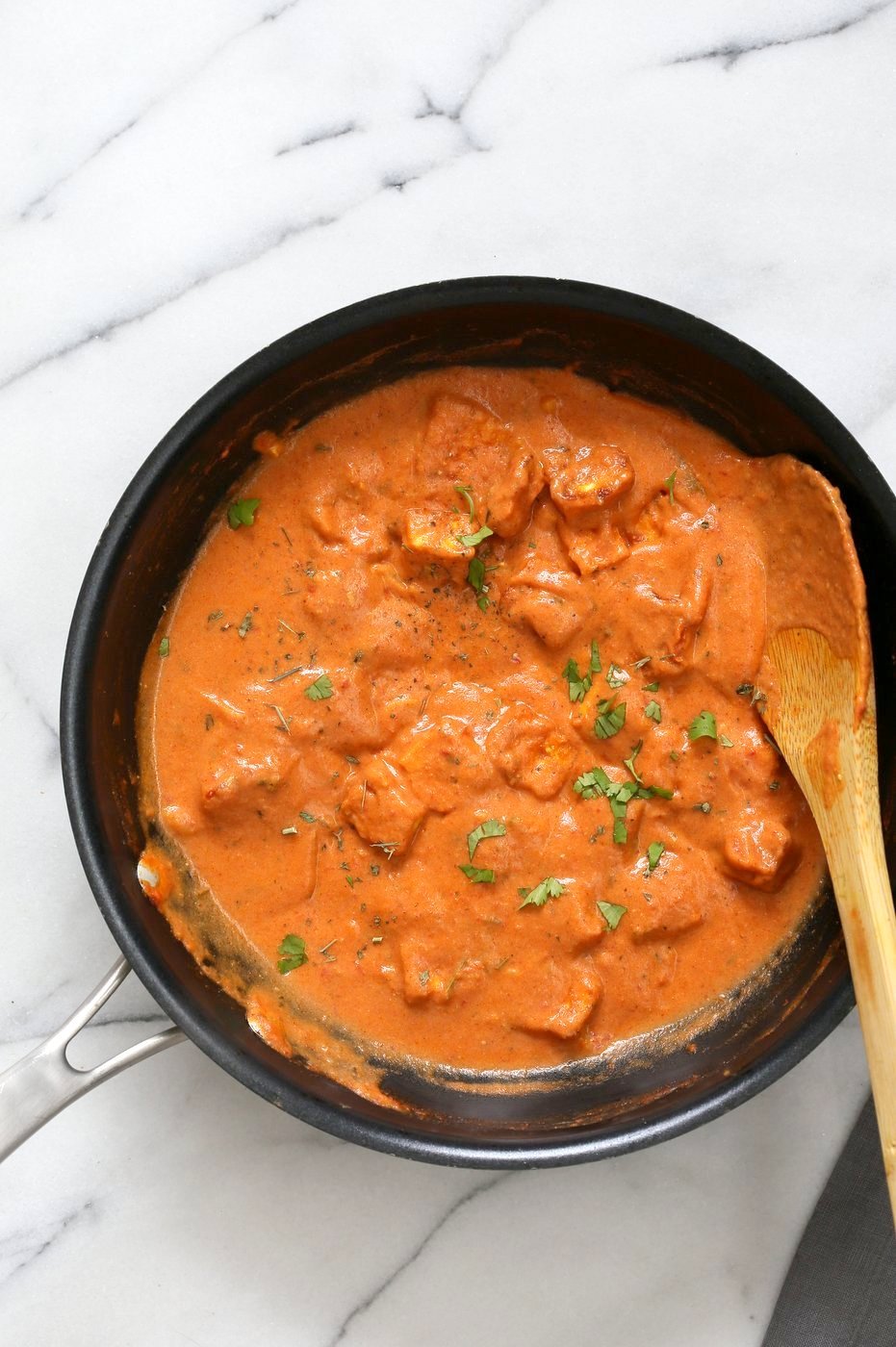 Restaurant Style Tofu Butter Masala Recipe - Indian Butter Tofu "Paneer". Dairy-free Tofu Paneer Butter Masala. Tofu is marinated and baked then simmered in tomato ginger cashew sauce. Vegan Gluten-free Recipe. | VeganRicha.com