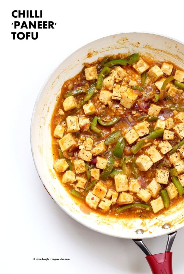 Chilli Tofu - Indian Chilli "Paneer" Recipe. Chilli Paneer is an Indo-chinese fusion stir fry served with other fusion noodles or fried rice. Crisp Tofu replaces the Paneer cheese in this delicious and quick version. Vegan Gluten-free Nut-free Recipe | VeganRicha.com #vegan #glutenfree #veganricha