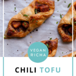 chilli garlic tofu puff pastries on the baking sheet, text overlay